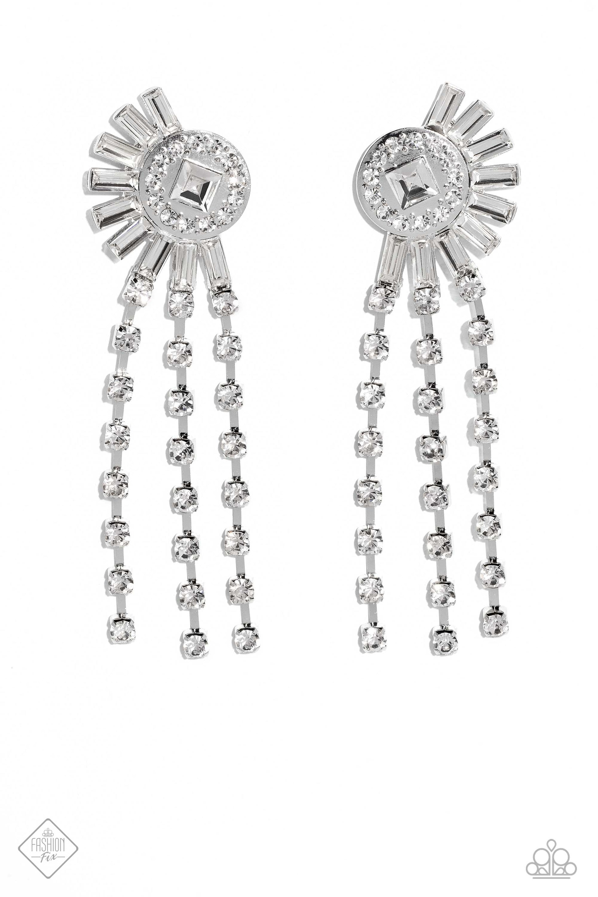Paparazzi Accessories Torrential Twinkle - White Encased in square silver fittings, three strands of dainty, glistening, white gems cascade from a blindingly ornate circular frame. Emerald-cut white gems explode from the rhinestone-dusted frame for additi