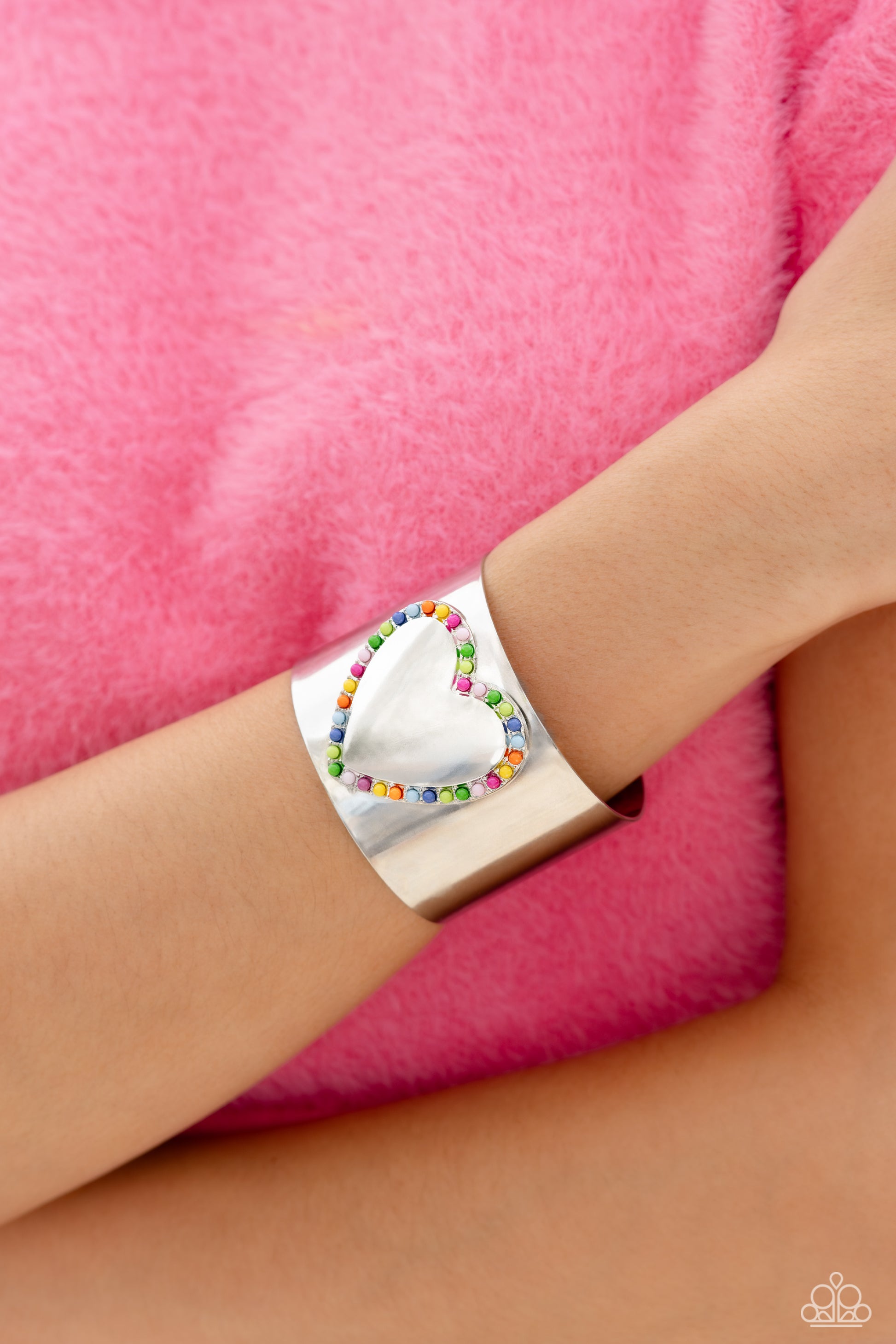 Paparazzi Accessories Cuffing Season - Multi Featuring Rose Violet, light pink, Classic Green, Kohlrabi, Persian Jewel, Summer Song, High Visibility, red, and orange beads, the center of a thick silver cuff swoops and curls into a charming heart, creating