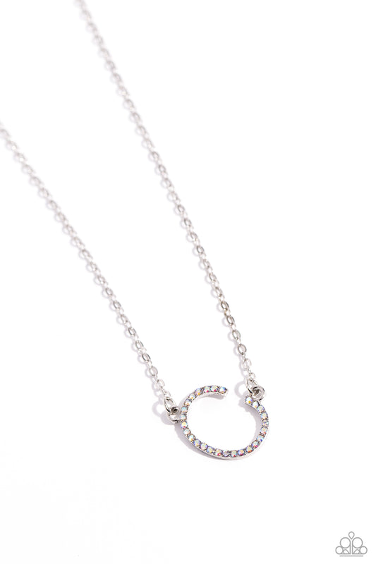 Paparazzi Accessories INITIALLY Yours - C - Multi Embossed with dainty iridescent rhinestones, a silver letter "C" hovers below the collar from a dainty silver chain, for a sentimentally simple design. Features an adjustable clasp closure. Due to its pris