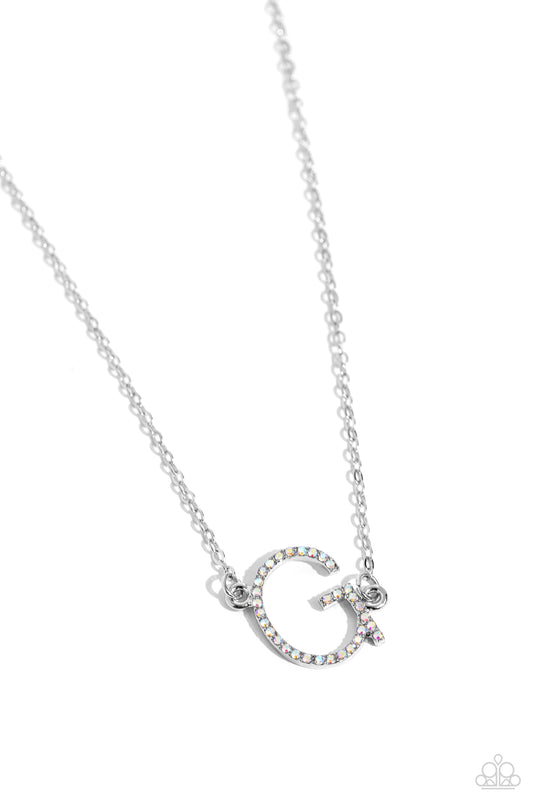 Paparazzi Accessories INITIALLY Yours - G - Multi Embossed with dainty iridescent rhinestones, a silver letter "G" hovers below the collar from a dainty silver chain, for a sentimentally simple design. Features an adjustable clasp closure. Due to its pris