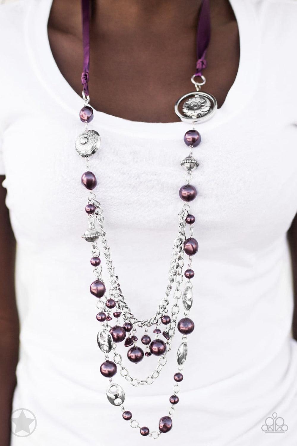 Paparazzi Accessories All The Trimmings - Purple A silky purple ribbon replaces a traditional chain to create a timeless look. Pearly deep purple beads and funky silver pieces intermix with varying lengths of silver chains to give a fresh take on a Victor
