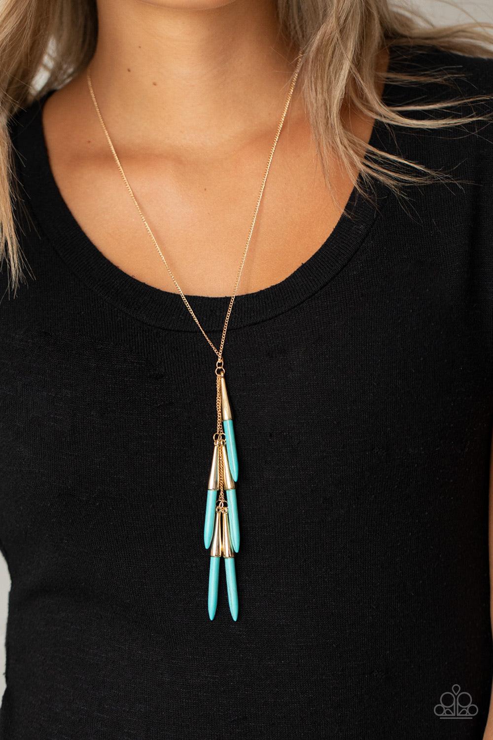 Paparazzi Accessories PRIMITIVE And Proper - Blue Capped in glistening gold fittings, refreshing turquoise stone tusk-like bars haphazardly dangle from two dainty gold chains, creating an earthy fringe at the bottom of a lengthened gold chain. Features an