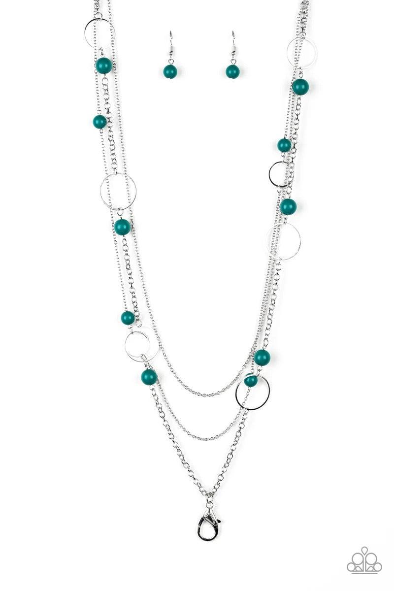 Paparazzi Accessories Beachside Babe - Green *Lanyard Featuring refreshing green beads and shimmery silver hoops, mismatched silver chains layer down the chest for a seasonal look. A lobster clasp hangs from the bottom of the design to allow a name badge