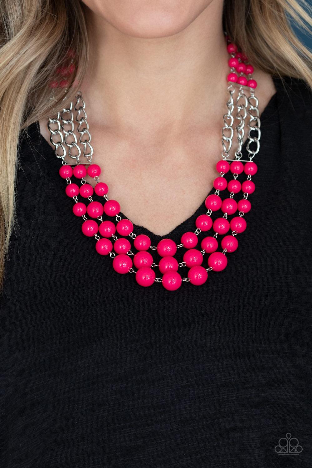 Paparazzi Accessories A La Vogue - Pink Sections of thick silver chains and bubbly pink beaded rows layer below the collar, creating statement-making layers. Features an adjustable clasp closure. Sold as one individual necklace. Includes one pair of match