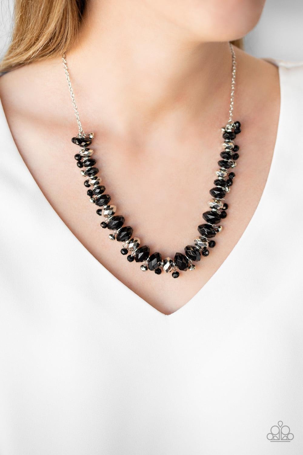 Paparazzi Accessories BRAGs To Riches - Black Faceted silver and black beads are threaded along an invisible wire below the collar. Dainty silver and black beads dangle from the colorful combination, creating an edgy fringe. Features an adjustable clasp c