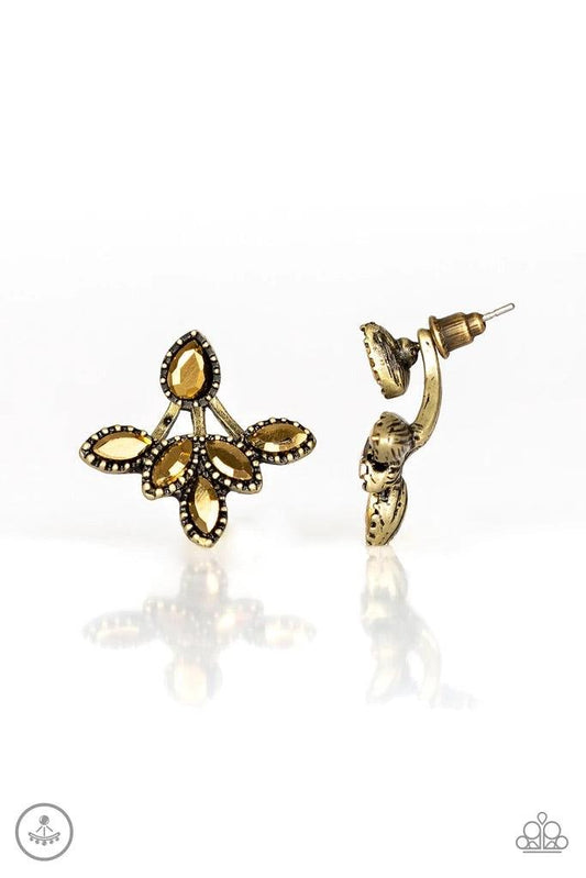 Paparazzi Accessories A Force To BEAM Reckoned With - Brass A solitaire teardrop aurum rhinestone attaches to a double-sided post, designed to fasten behind the ear. Encrusted in matching aurum rhinestones, a double-sided post peeks out beneath the ear, c