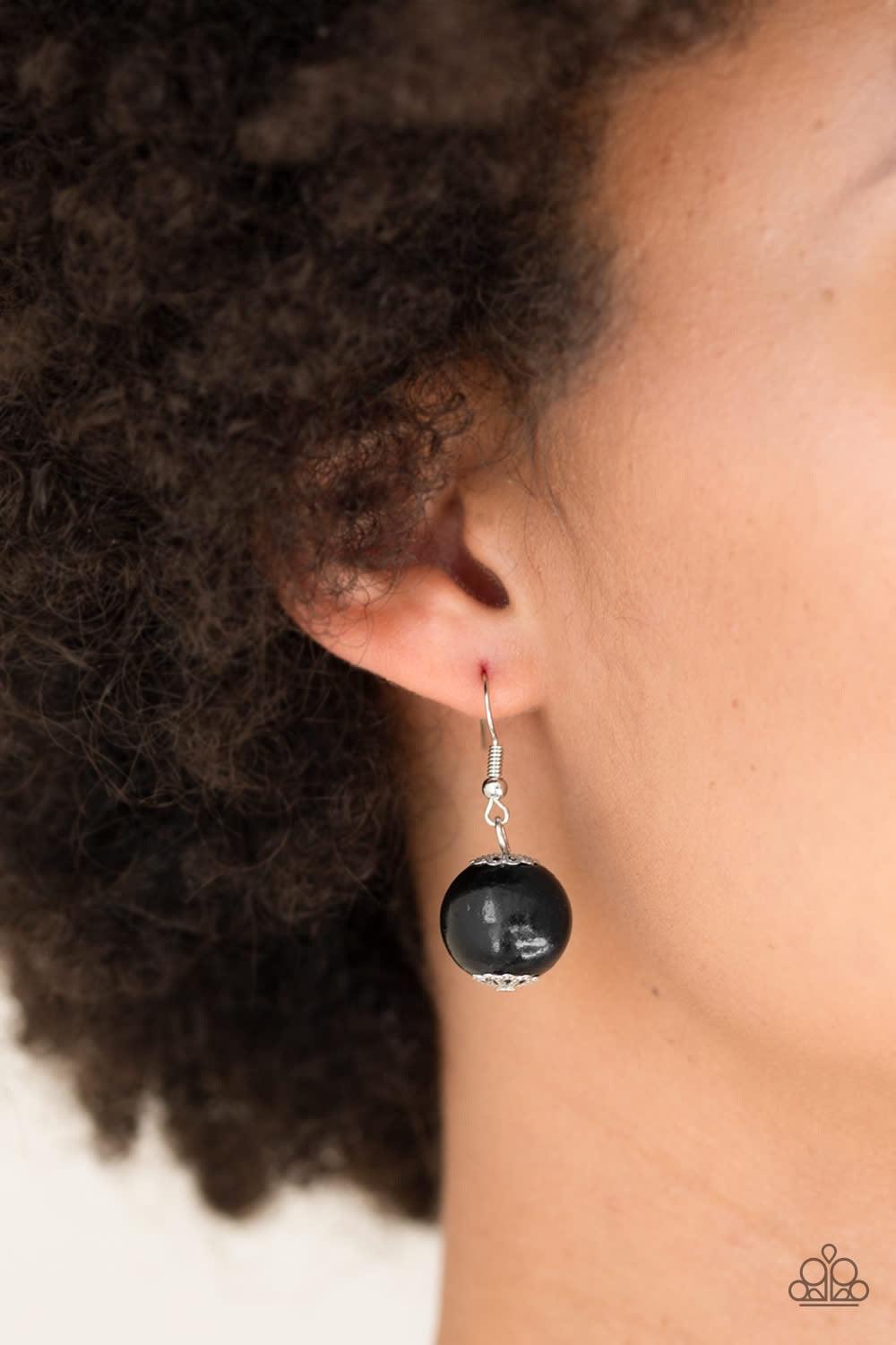 Paparazzi Accessories Panama Panorama - Black Infused with dramatic silver beads, an array of shiny black wooden beads drape across the chest for a summery look. Features a button-loop closure. Jewelry