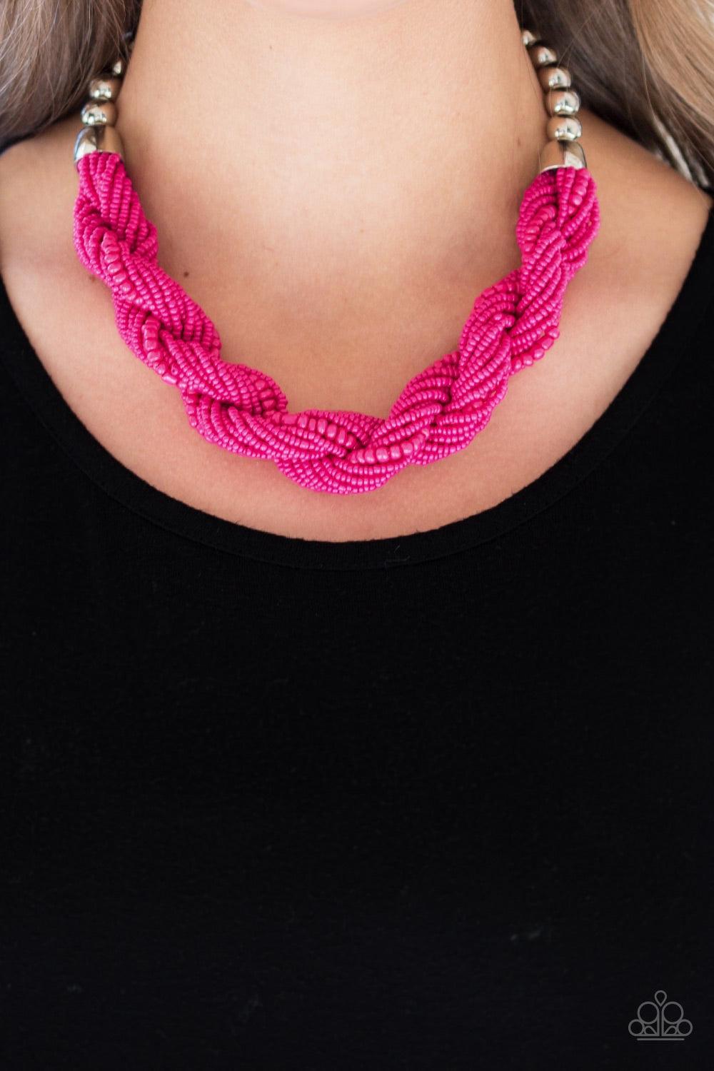 Paparazzi Accessories Savannah Surfin - Pink Glistening silver beads give way to strands of twisting pink seed beads below the collar for a summery flair. Features an adjustable clasp closure.