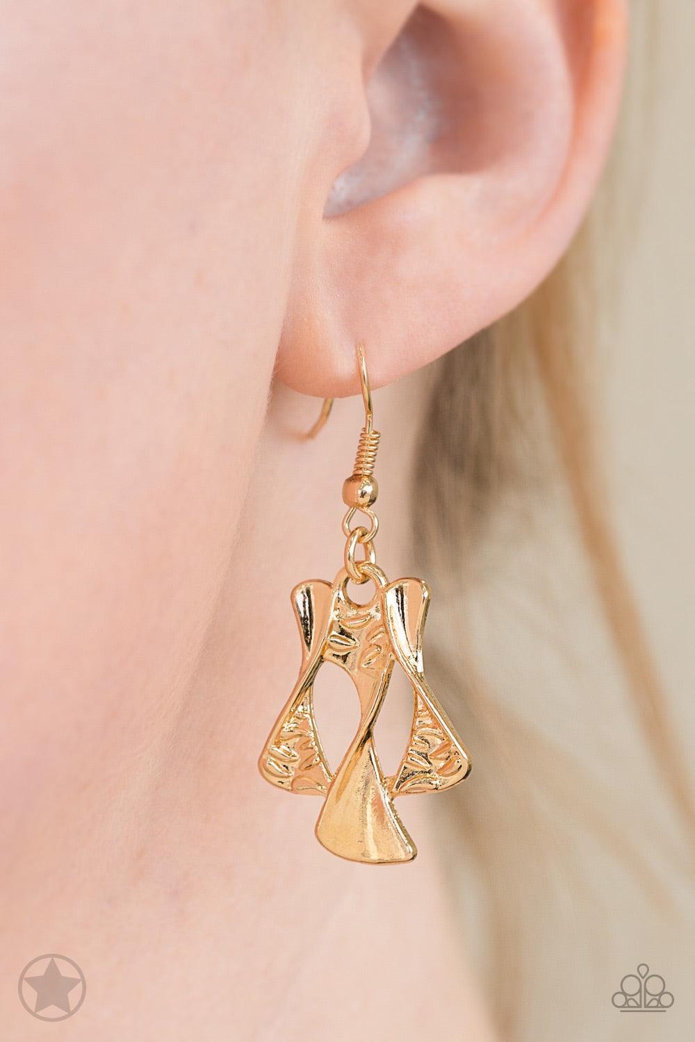 Paparazzi Accessories The Sands Of Time - Gold Twisted gold hourglasses dance along a chunky gold chain with tiny peach rhinestones adding sparkling, elegant accents. Beautiful textured pieces add depth to the design. Features an adjustable clasp closure.