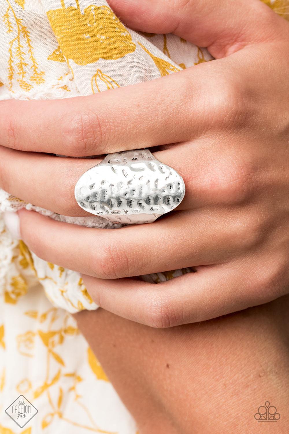 Paparazzi Accessories Revamped Ripple - Silver Wavy texture is delicately hammered across the front of a thick silver frame, creating a rippling centerpiece. Features a stretchy band for a flexible fit. Sold as one individual ring. Jewelry