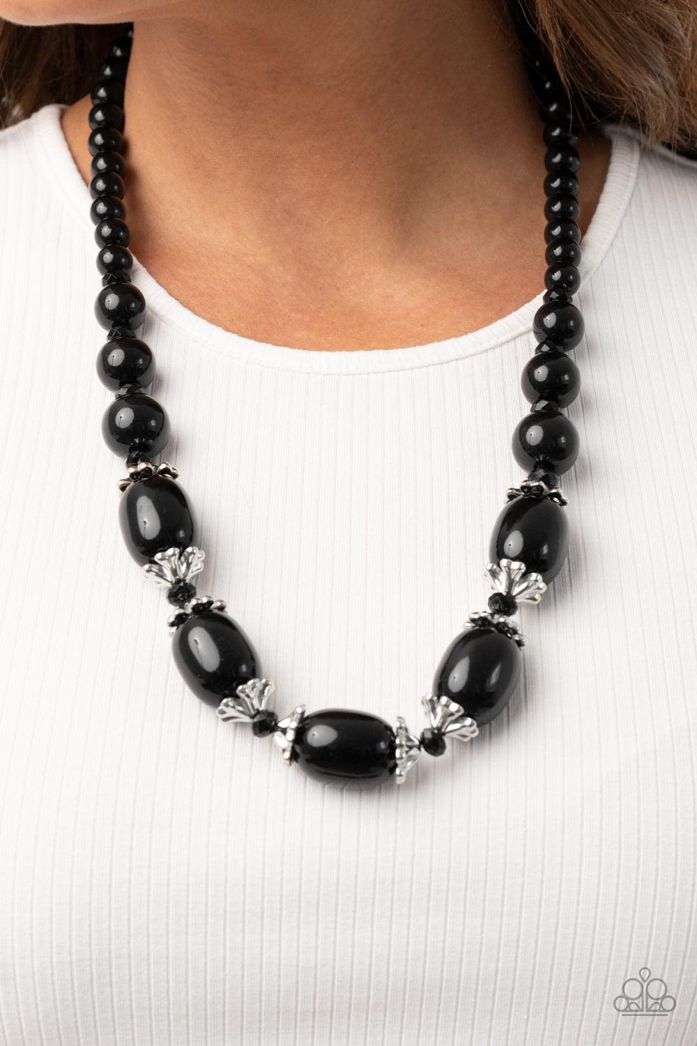 Paparazzi Accessories After Party Posh - Black Infused with decorative silver fittings and black crystal-like beads, oversized black beads boldly link below the collar for a glamorous pop of color. Features an adjustable clasp closure. Sold as one individ