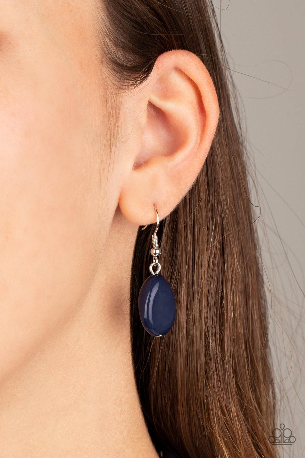 Paparazzi Accessories Two-Story Stunner - Blue Two rows of dainty silver beads and faceted Blue Depths faux stone beads alternate along invisible wires below the collar, creating bold, colorful layers. Features an adjustable clasp closure. Sold as one ind