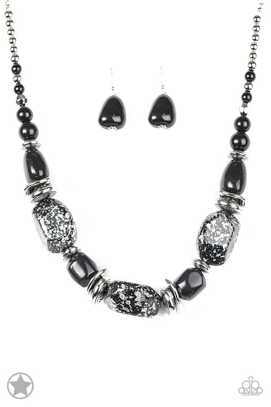 Paparazzi Accessories In Good Glazes - Black Chunky black beads with speckles of silver and a gorgeous glazed finish are threaded together with thick silver rings and smooth black beads. Features an adjustable clasp closure. Jewelry