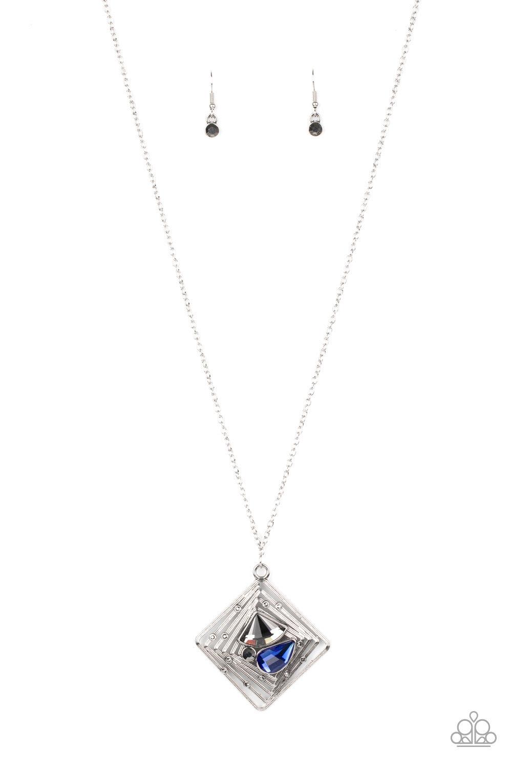 Paparazzi Accessories Timelessly Tilted - Blue Dotted with dainty hematite rhinestones, textured silver bars twist and ripple into a stacked square frame. An abstract collection of round hematite, teardrop blue, and diamond shaped smoky rhinestones embell