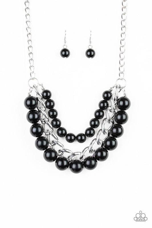 Paparazzi Accessories Empire State Empress - Black Two strands of dramatic black beads flank one strand of oversized silver chain, creating statement-making layers below the collar. Features an adjustable clasp closure. Sold as one individual necklace. In
