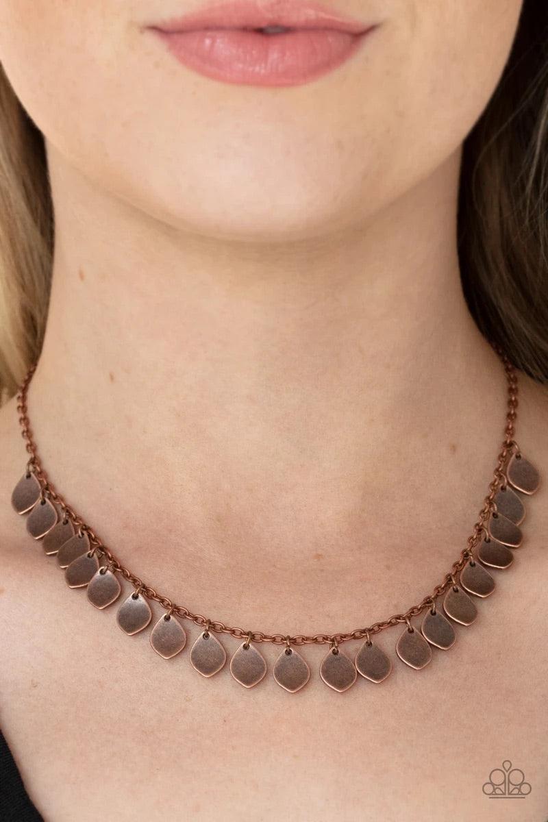 Paparazzi Accessories Dainty Discovery - Copper Teardrop copper discs drip from a dainty copper chain, creating a rustic fringe below the collar. Features an adjustable clasp closure. Sold as one individual necklace. Includes one pair of matching earrings