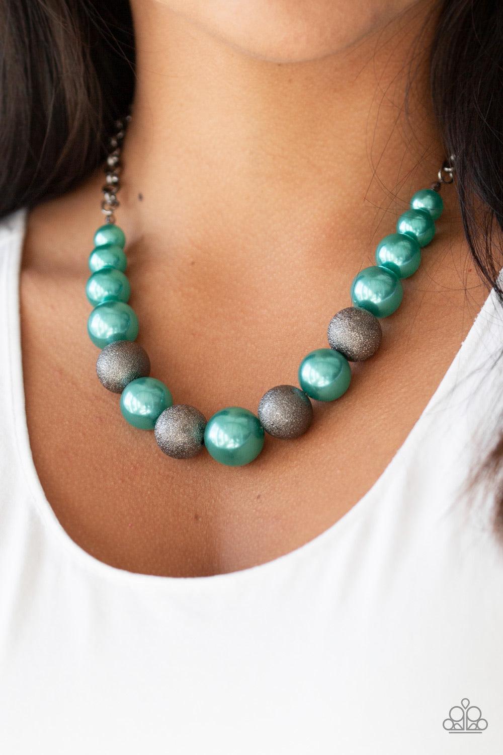Paparazzi Accessories Color Me CEO - Blue Dusted in glitter, sparkling gunmetal and pearly Ultramarine Green beads are threaded along an invisible wire below the collar for a glamorous look. Features an adjustable clasp closure. Sold as one individual nec
