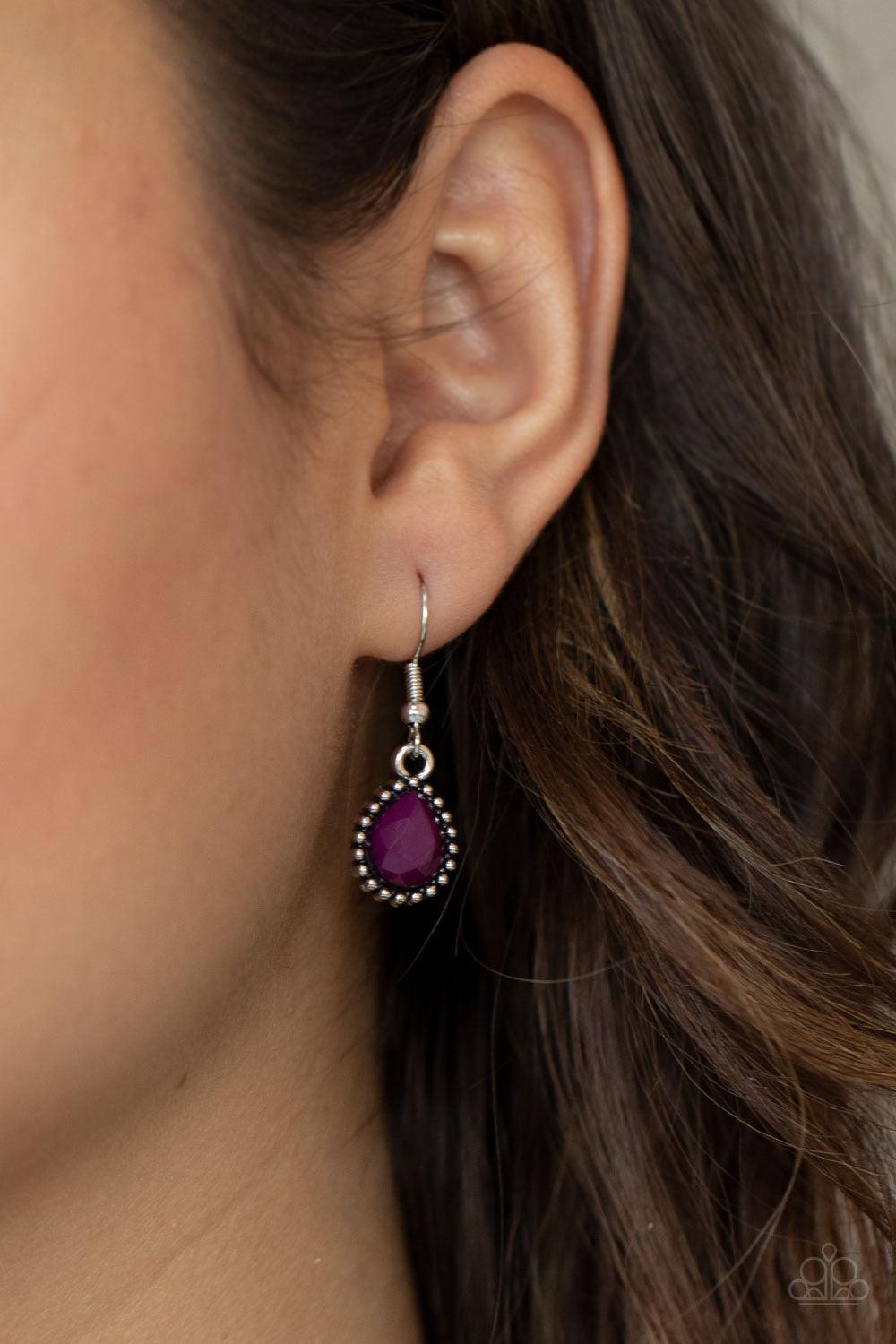 Paparazzi Accessories Breathtaking Brilliance - Purple Featuring smooth and studded silver frames, a collection of teardrop, oval, and triangular plum beads coalesce with matching white rhinestones below the collar for a glamorous pop of collar. Features